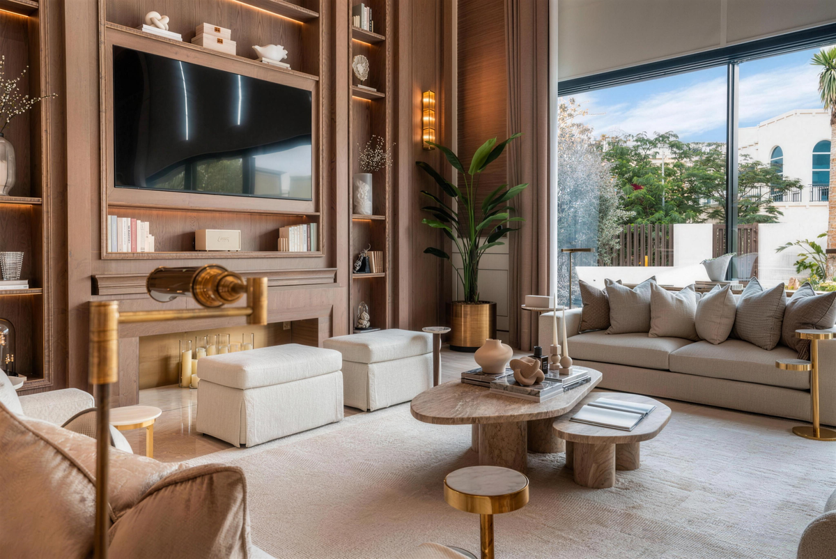 Living room with walnut wall panelling – Jumeirah Park villa by Hive Living